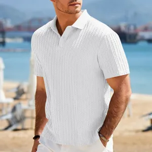 Close-up detail of white knit texture polo shirt fabric, showing beach outdoor scene background.