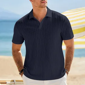 Men's knit textured polo shirt short sleeve detail view on beach, summer casual style.