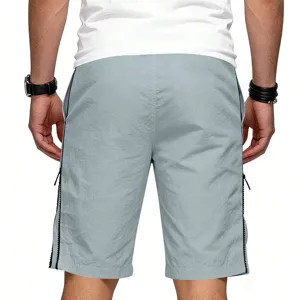 Shorts de loisirs homme été streetwear gris poches zippées sport basketball vue détail