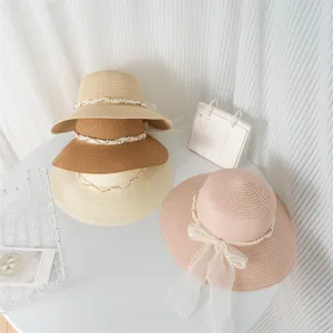Cappello di paglia tesa larga nastro pizzo perla spiaggia sole donna estate moda chic