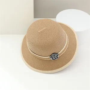 Elegant woven straw hat for women, featuring a chic floral band, perfect for summer beach and sunny days.