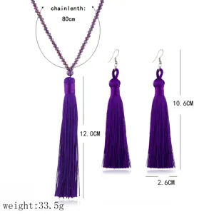 Elegantes Set aus langer Kristall-Perlen-Quasten-Halskette und passenden Ohrringen.