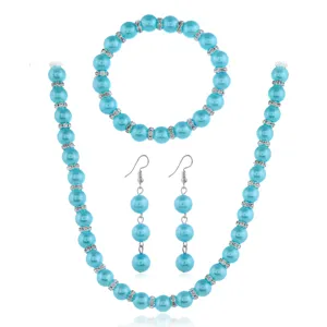 Blaues Kunstperlen Schmuckset mit Strass Abstandhaltern, Halskette, Armband und Ohrringen.