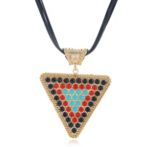 Chic multi-strand black cord necklace with bold geometric rhinestone pendant for women fashion.