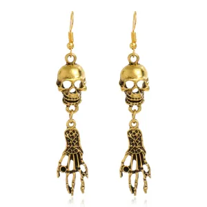Pendientes colgantes de calavera y mano de esqueleto de oro gótico vintage para mujer.