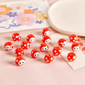 Red polka dot smiley face glass beads for DIY earrings handmade jewelry crafting accessories.