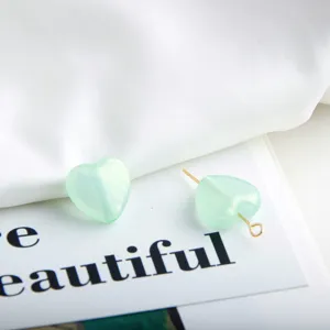 DIY sweet light green heart-shaped glitter beads for handmade earrings and jewelry crafting supplies.