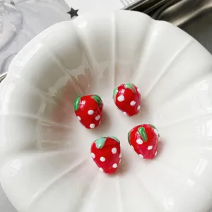 Handmade glass strawberry beads for DIY jewelry making, charm bracelets, necklaces and straps.