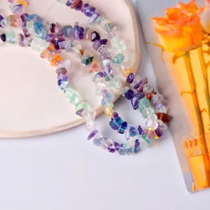 Detailed view of colorful crystal stone chip beads string for DIY jewelry making accessories.