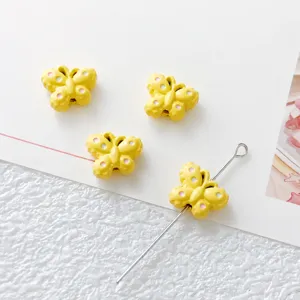 Yellow butterfly alloy loose beads detail for DIY phone chain bracelet handmade jewelry accessories.