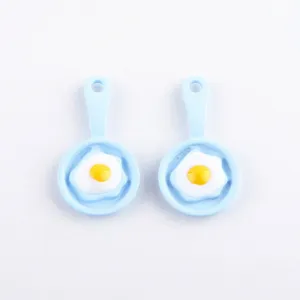 Mini blue frying egg pan resin charms for handmade DIY earrings jewelry making details.