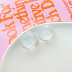 Cabochon in resina accessori fai da te lucidi bianco perla rotondo dettaglio foto