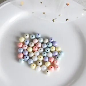 Macaron pastel round resin beads, colorful DIY craft supplies, smooth matte finish hole design.