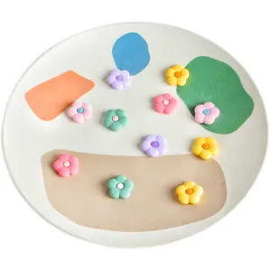 Colorful PVC small flower charms for DIY handmade hair accessories, earrings, and jewelry making.