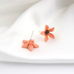 Cute orange flower stud earrings with metal pin back, stylish DIY jewelry accessory for women.