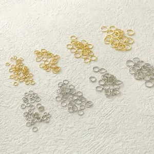 Gold and silver metal jump rings, DIY jewelry findings connectors for handmade crafts.