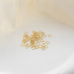 18K gold plated jump rings detail shot, essential DIY jewelry making findings and connectors.