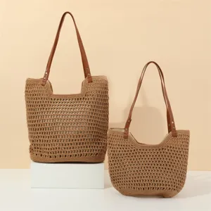 Discover this stylish handmade crochet beach bag detail, perfect for seaside summer vacation.