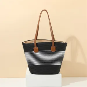 Black and white striped straw woven shoulder tote bag for summer beach vacation details