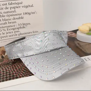Detailed view of a silver rhinestone empty top hat, stylish summer sun protection visor cap for women.