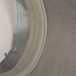 Close-up view of the cap sweatband, breathable fabric and neat stitching details.