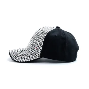 Black rhinestone baseball cap side detail, shiny crystal diamond visor hat for women fashion.