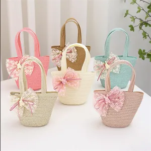 Bolsito de paja para niños tejido con lazo de encaje y conejo, bolso de verano multicolor para niñas.