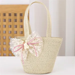 Bolso de mano de paja tejida para niños con lazo de encaje dulce y colgante de conejo de verano.