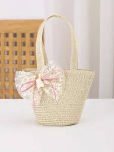 Bolso de paja trenzada lindo para niños con lazo y conejo para el verano y la playa.