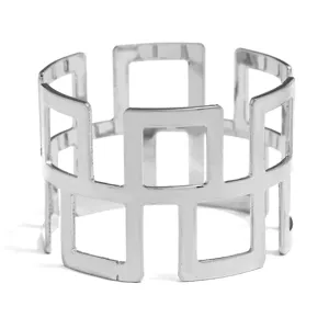 Detailed close-up of a silver metal napkin ring featuring a classic geometric hollow design.