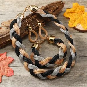 Böhmisches geflochtenes 3-teiliges Schmuckset mit schwarzem silbernem goldenem Design.