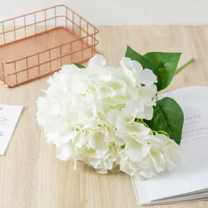 Artificial white hydrangea flower detail shot for home decor and wedding floral arrangement.