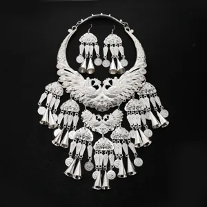 Exaggerated retro silver peacock collar necklace with matching tassel earrings set.