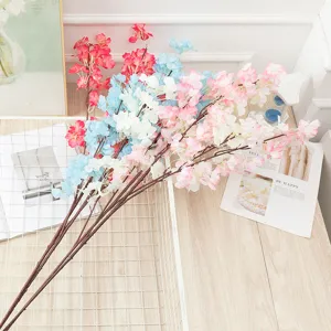 Artificial cherry blossom branches fake flowers for home wedding decor, multi-color floral arrangements.