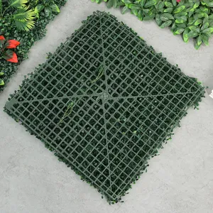 Artificial plant wall green grid backing plastic fake lawn backdrop panel detail view