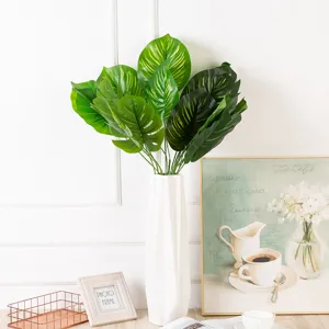 Plante en pot de feuilles de monstera artificielles feuillage vert décoration d'intérieur faux