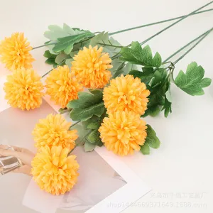 Artificial yellow pompon chrysanthemum bouquet for home decor wedding floral arrangement.