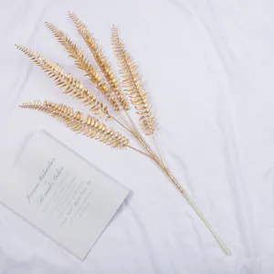 Artificial golden fern leaves plastic plant for wedding floral arrangement home decor detail