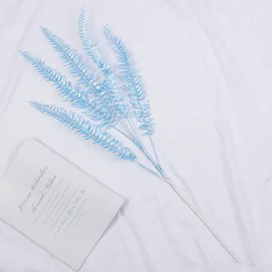 Blue artificial fern branch plastic plant leaves for wedding floral arrangement home decor.