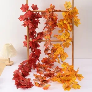 Artificial autumn maple leaf vines for Halloween and home decor, realistic hanging plants.