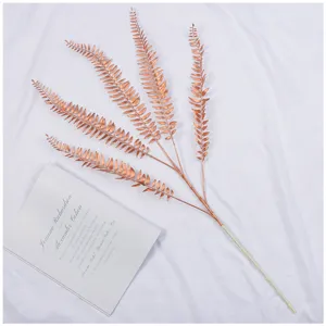 Artificial copper fern branch plastic leaves for wedding floral arrangement home decor.