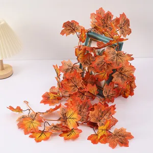 Artificial autumn maple leaf vine garland for holiday home decor and indoor ceiling hanging.