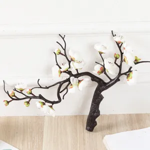 Kunstmatige pruimenbloesem tak bonsai nepplant voor huis restaurant en feestelijke decoratie