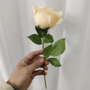 Artificial champagne rose flower detail closeup, premium fake floral decor for home.