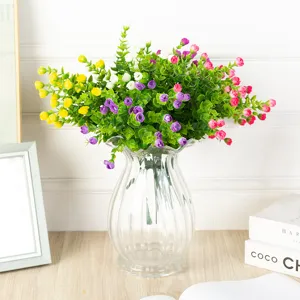 Artificial eucalyptus flower with small rose buds, plastic potted plant for home decor.