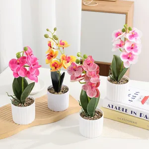 Artificial Phalaenopsis orchid potted plant faux flower for home indoor table decor.