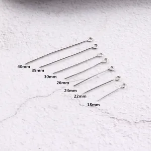 Silver eye pins jewelry findings set in various lengths from 18mm to 40mm for DIY craft projects.