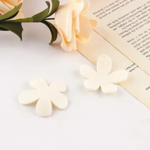 White acrylic flower charm detail, perfect for DIY handmade earrings and jewelry crafting.