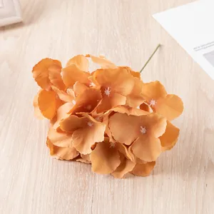 Artificial silk hydrangea flower head for wedding decoration, floral wall backdrop, and photography props.