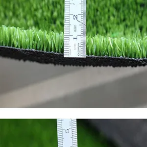 Artificial turf grass detail view showing high density fibers and strong backing.